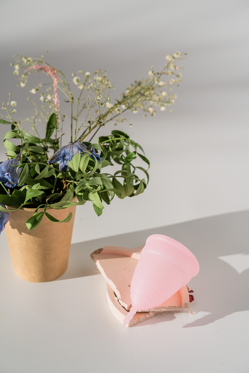Pink Menstrual Cup with Flowers  with Sunlight and Shadows